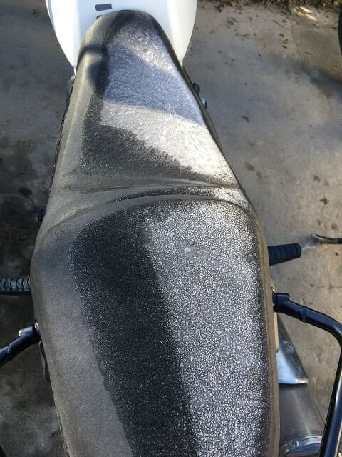 Frozen water on a motorcycle seat, Leh